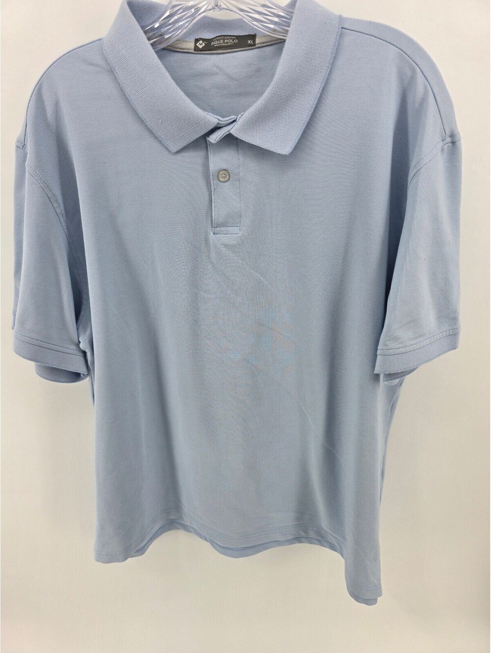 Antigua light blue short sleeve polo shirt